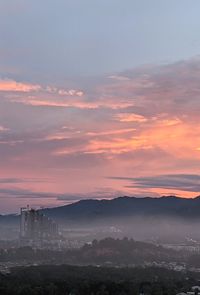 Scenic view of mountains against sky during sunset