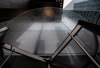 High angle view of wet glass on table
