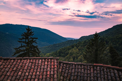 Scenic view of mountains against sky during sunset