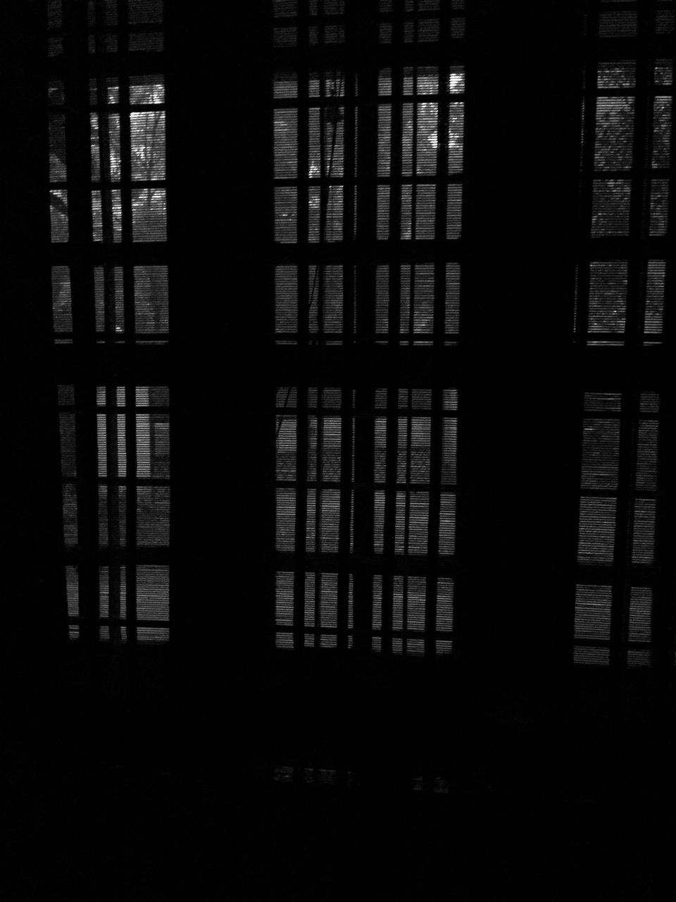 architecture, window, built structure, building exterior, glass - material, indoors, building, city, dark, residential building, transparent, no people, residential structure, modern, office building, pattern, day, sunlight, reflection