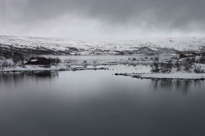 Scenic view of snow covered lake