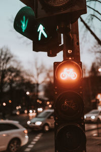 View of traffic sign on road in city