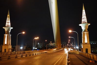 Illuminated street lights at night