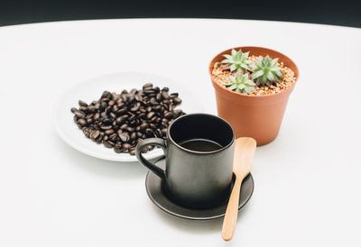 Close-up of coffee cup on table