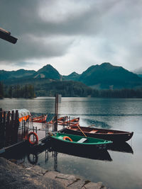 Boats moored at harbor