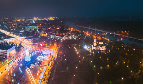 High angle view of illuminated city at night