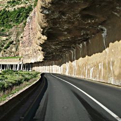 Country road passing through landscape