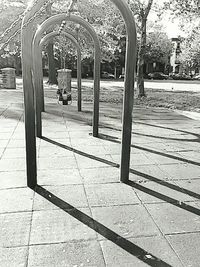 Shadow of people on footpath