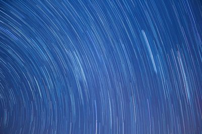 Full frame shot of star trail in sky