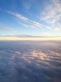 Aerial view of landscape against cloudy sky