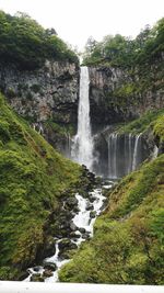 Scenic view of waterfall in forest