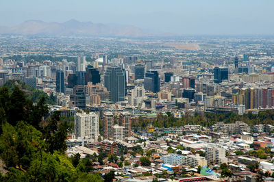 High angle view of buildings in city against sky