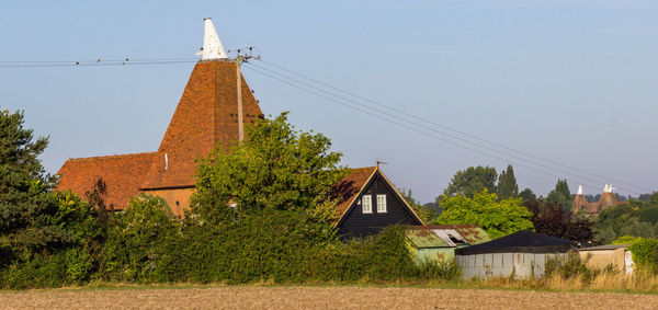 Low angle view of traditional building against clear sky