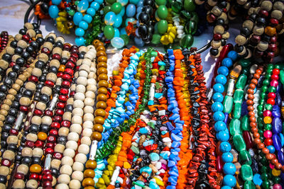 Close-up of multi colored jewelry for sale