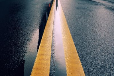 Full frame shot of wet street during rainy season