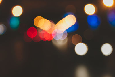 Defocused image of illuminated lights at night