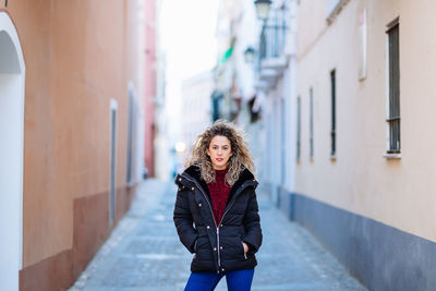 Portrait of woman standing outdoors