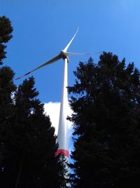 Low angle view of wind turbine against sky