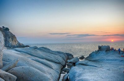 Scenic view of sea at sunset