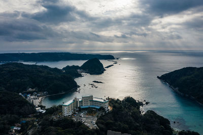 Aerial view of building against sea and sky