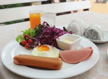 Close-up of breakfast served on table