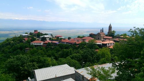 Scenic view of residential district against sky