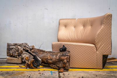 Close-up of sofa on wall