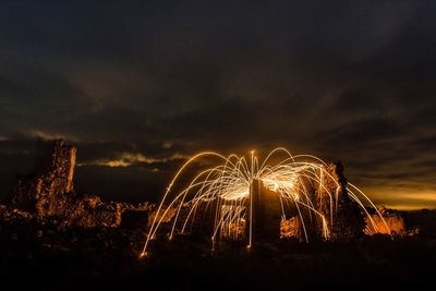 Firework display at night