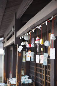 Row of animal wind chimes at store