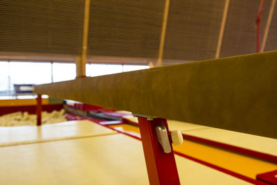 Low angle view of yellow umbrella on table at temple