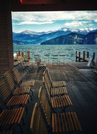 Scenic view of sea and mountains against sky