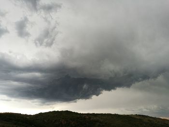 Storm clouds over landscape