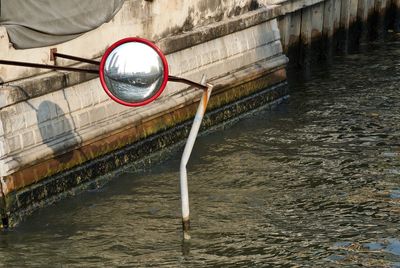 Reflection of bicycle on river