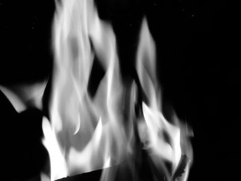 Close-up of fire against black background