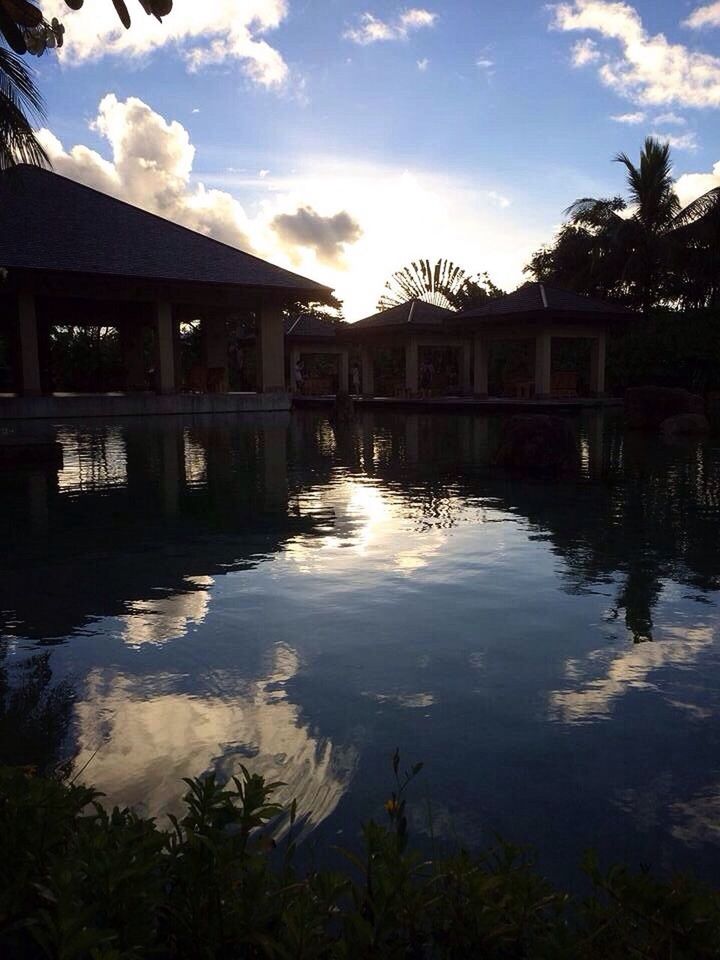 architecture, built structure, water, reflection, building exterior, sky, cloud - sky, tree, waterfront, bridge - man made structure, river, cloud, canal, connection, house, outdoors, no people, building, sunset, lake