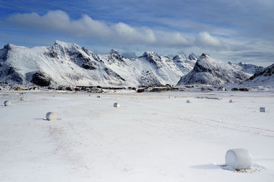 Scenic view of snowcapped mountains against sky