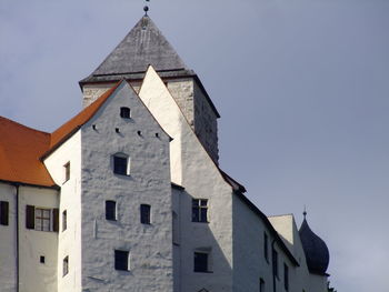 Low angle view of buildings against clear sky