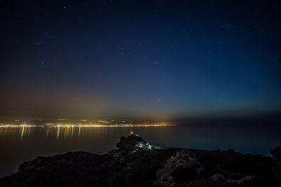 Scenic view of illuminated star field against sky at night