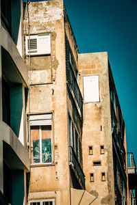 Low angle view of residential building against sky