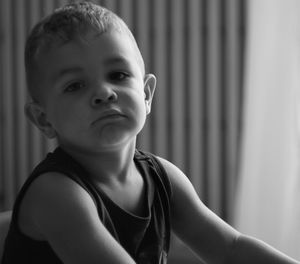 Portrait of cute boy at home