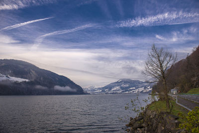 Beautiful view of lake lucerne at sunrise, blue sky, morning light, switzerland alps mountain