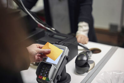 Man paying in department store