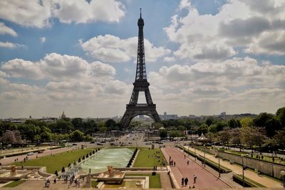 Silhouette of eiffel tower against cloudy sky