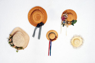 High angle view of coffee beans against white background