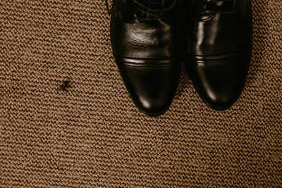 High angle view of shoes on fabric