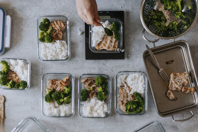 Person doing healthy meal prep at home