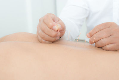 Close-up of hand holding hands