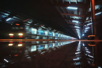 Illuminated railroad station at night