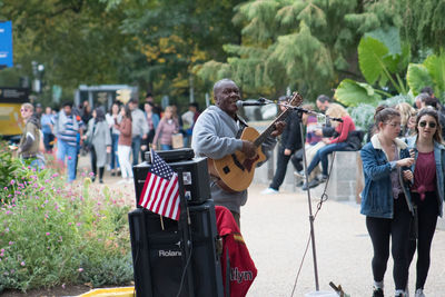 Group of people playing guitar