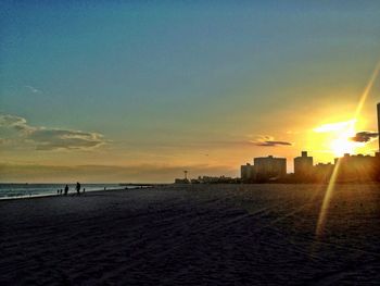 Scenic view of sea at sunset